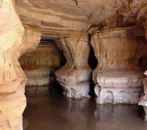 Limestone pillars and river inside the Sof Omar caves