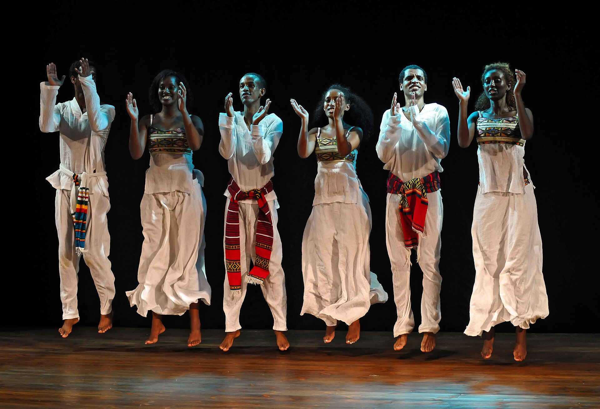 Women performing a shoulder dance similar to eskista