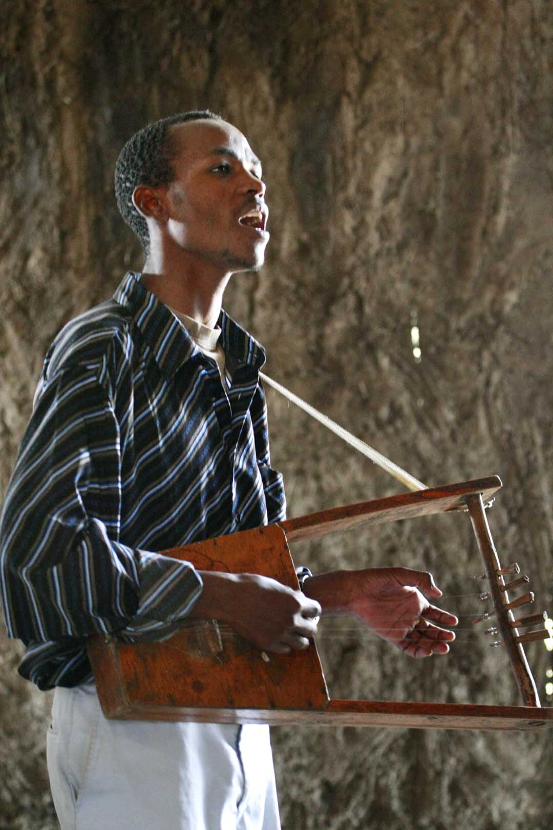 Man playing a krar, the Ethiopian lyre