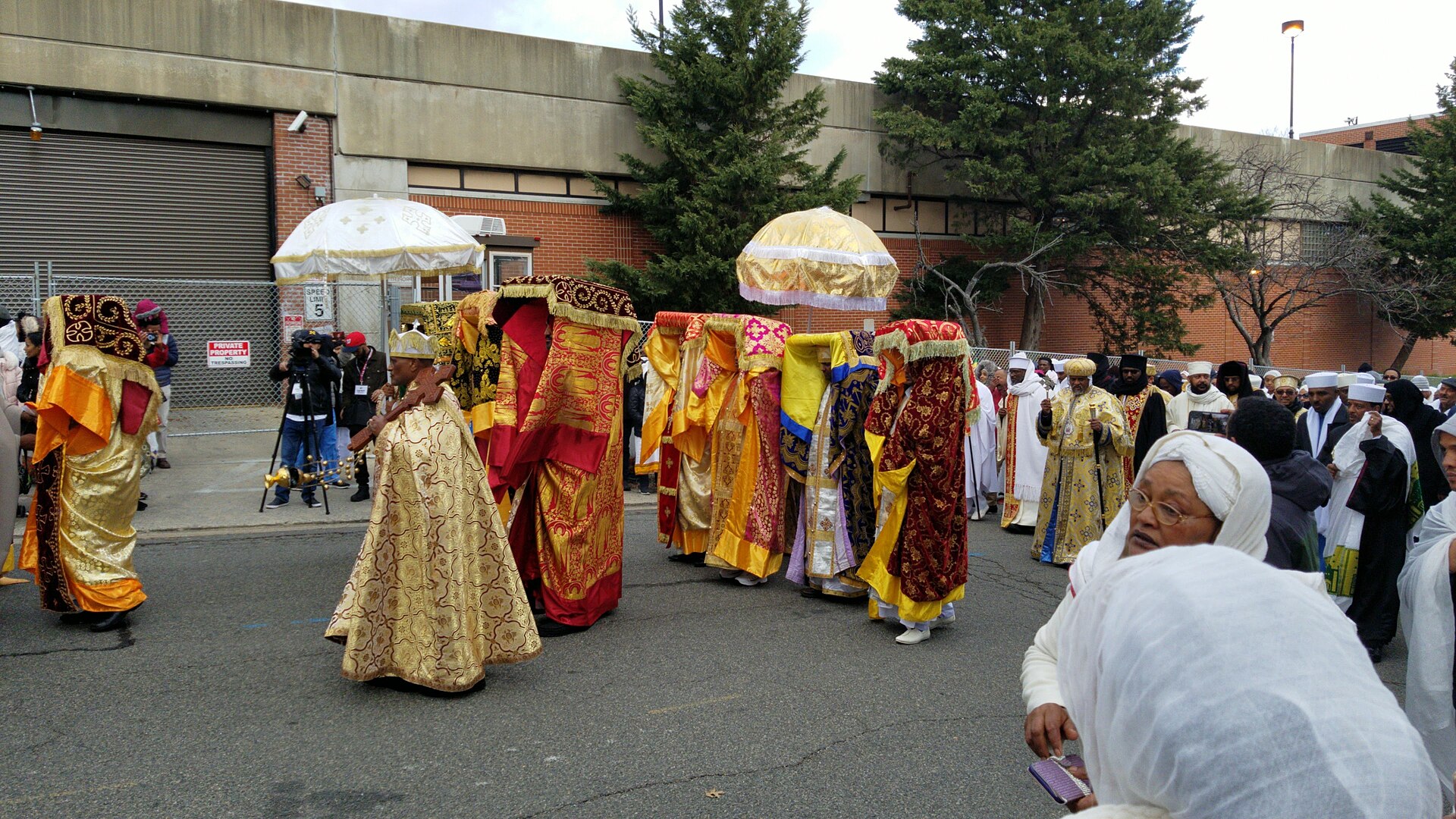 Priests carrying covered tabots in a Timkat procession
